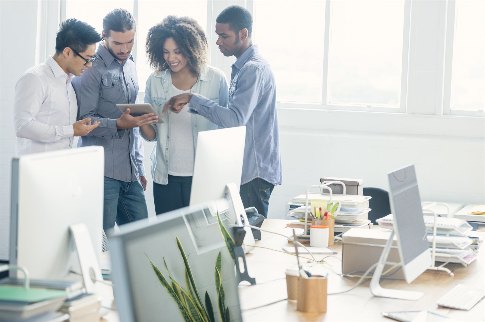 Diverse professional team collaborating in office